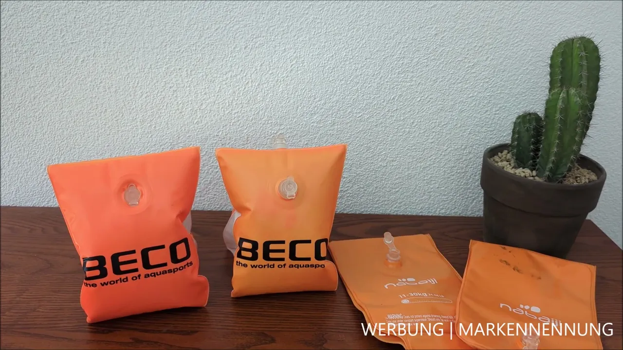 Aus meiner Sicht ist das knallige Orange eine hervorragende Signalfarbe, um Kinder im Wasser stets gut im Blick zu behalten.