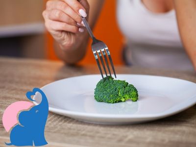 stillende Muetter essen rohen Brokkoli