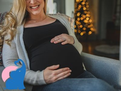 den Bauch einer Schwangeren streicheln